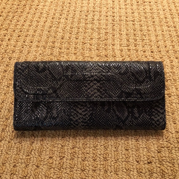 Banana Republic Handbags - Reptile print clutch w/magnetic fold,soft material